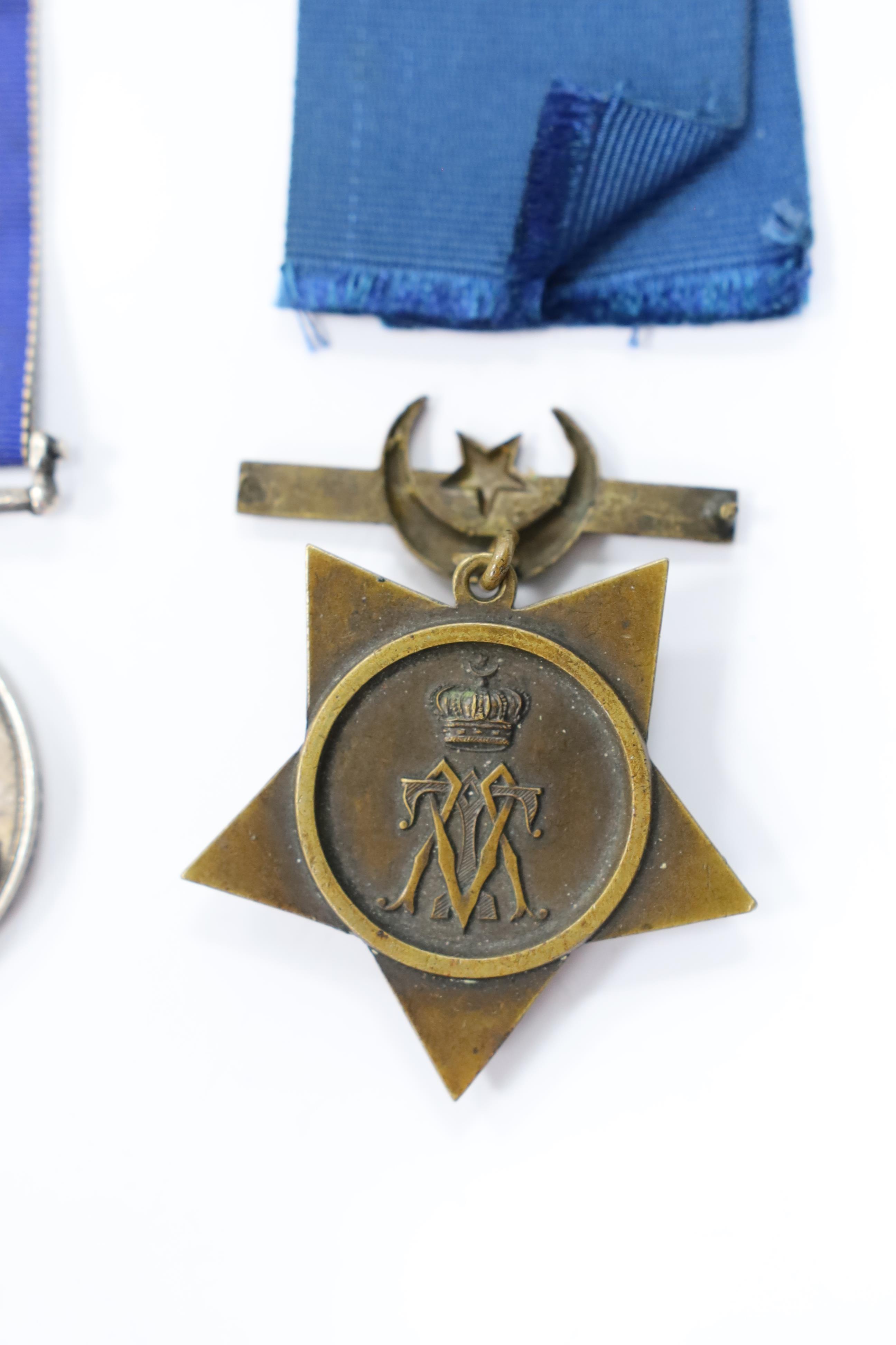 An Egypt Medal 1882-89 to 2636 Pte R.Hopwood. 2/Derby,R. and a Khedive's Star 1882.